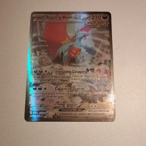 ancient roaring moon pokemon card Gigantamax Toxtricity Pokemon Metal Charm Pokemon Center Limited Charm –  SelectAnime main image 0